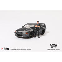 Mini GT 1/64 Nissan Skyline GT-R (R32) Nismo Gunmetal W/ Matsuda Figure Tsugio Matsuda Collection